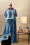 COORDINATO-BLUSA CON ROUCHE SUL FONDO MANICA-PANTALONE CON ELASTICO IN VITA