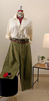 CAMICIA A RIGHE CON SCOLLO A V- MANICA PIPISTRELLO